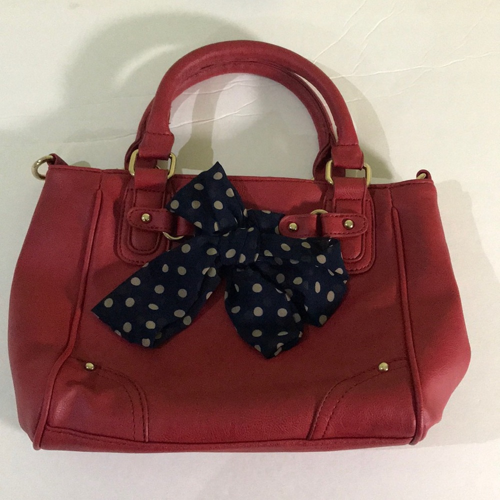 Brand new red purse with blue bow